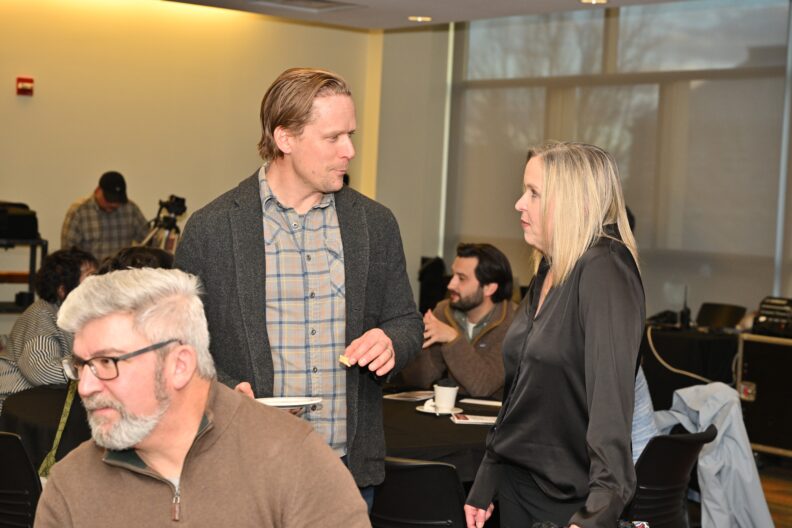 Attendees talking at 2024 Celebration of Assessment Excellence