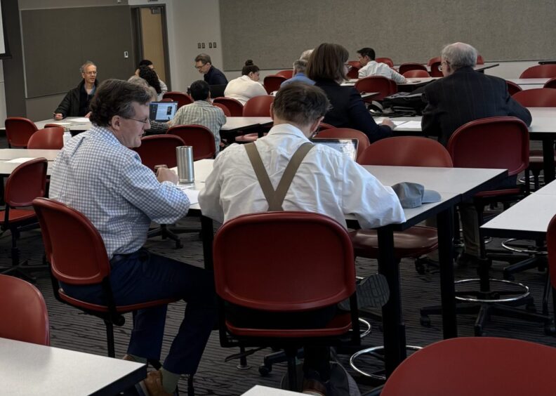 Physics faculty collaborating at Spring 2025 retreat