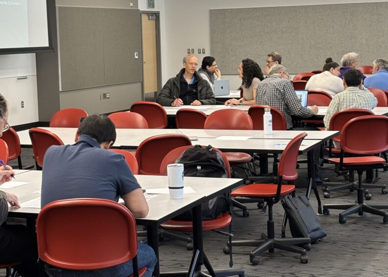 Physics faculty collaborating at Spring 2025 retreat