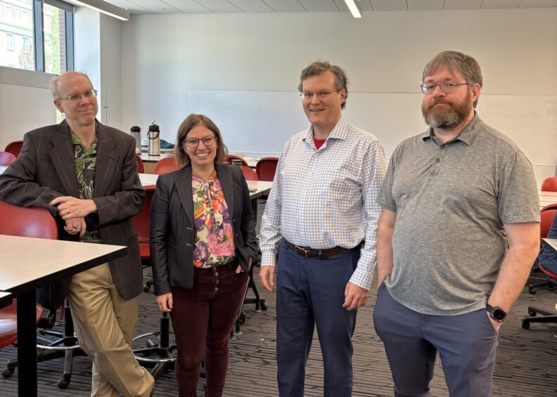 Physics faculty collaborating at Spring 2025 retreat