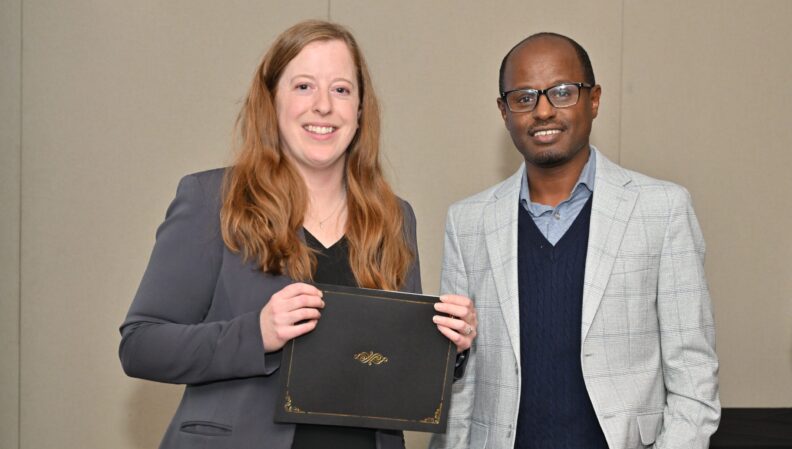 ACE Director Lindsey Brown presenting a certificate to the Civil Engineering, BS (Tri-Cities).