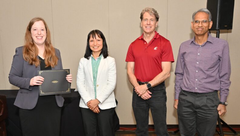 ACE Director Lindsey Brown presenting a certificate to the Computer Science, BS (Pullman).
