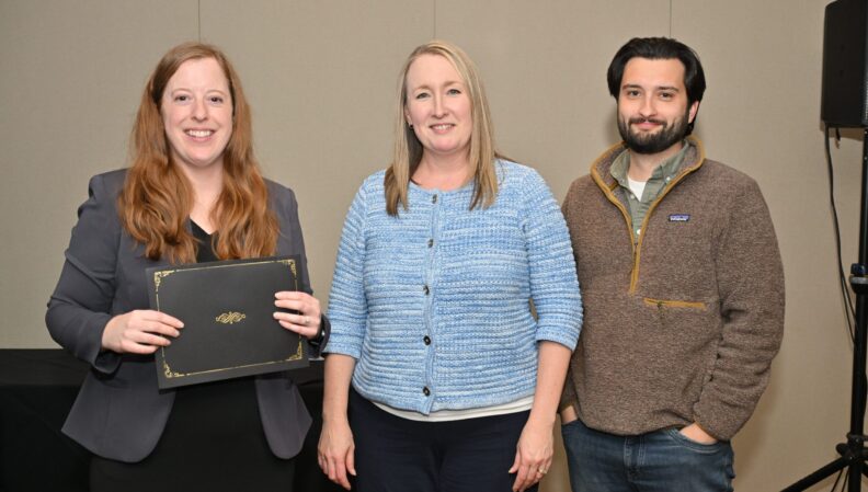 ACE Director Lindsey Brown presenting a certificate to the Nursing, BS.
