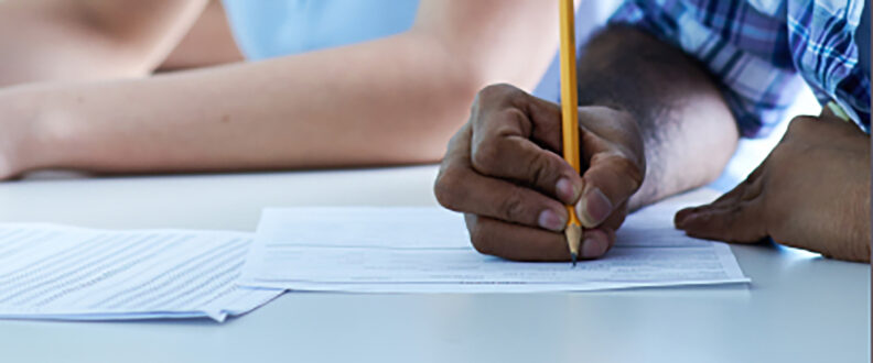 Students taking a writing placement exam.