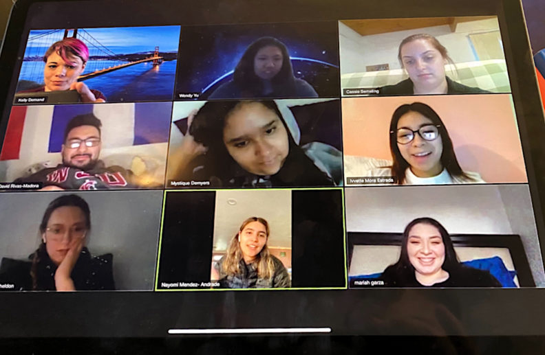 A view of Kelly Demand's tablet as she meets remotely with her student peer advisors.