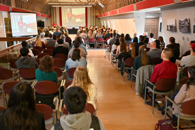 Provost and Executive Vice President Chris Riley-Tillman addresses the seated DAESA Awards Ceremony audience as the event begins.