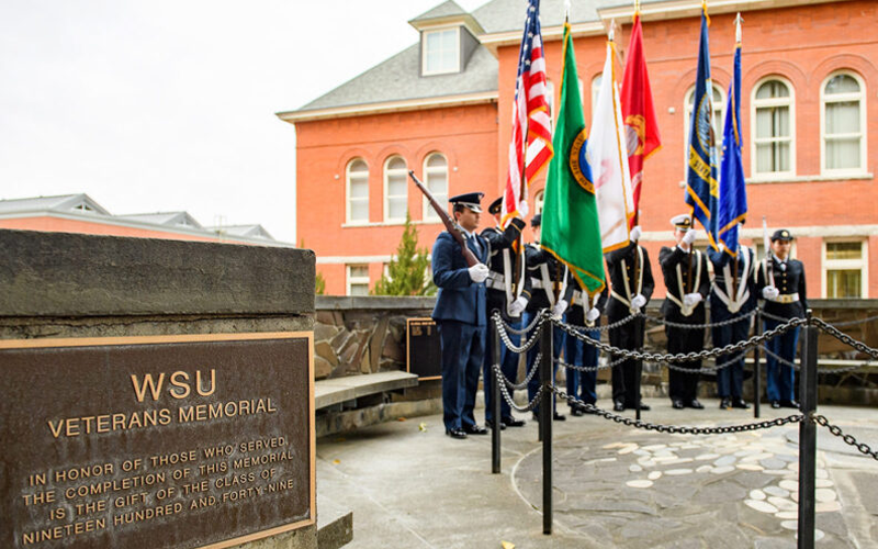 A military flag ceremony underway at the WSU Veterans memorial.