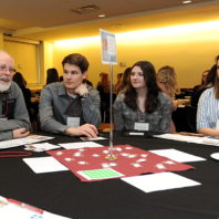 Howard Davis speaking to the students at his table.