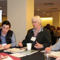 Lisa Gloss talking to the students at her table.
