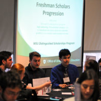 Students getting ready for the Freshman Scholars Progression presentation.