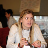 A student asking a question at the Freshman Scholars Progression 2018 event
