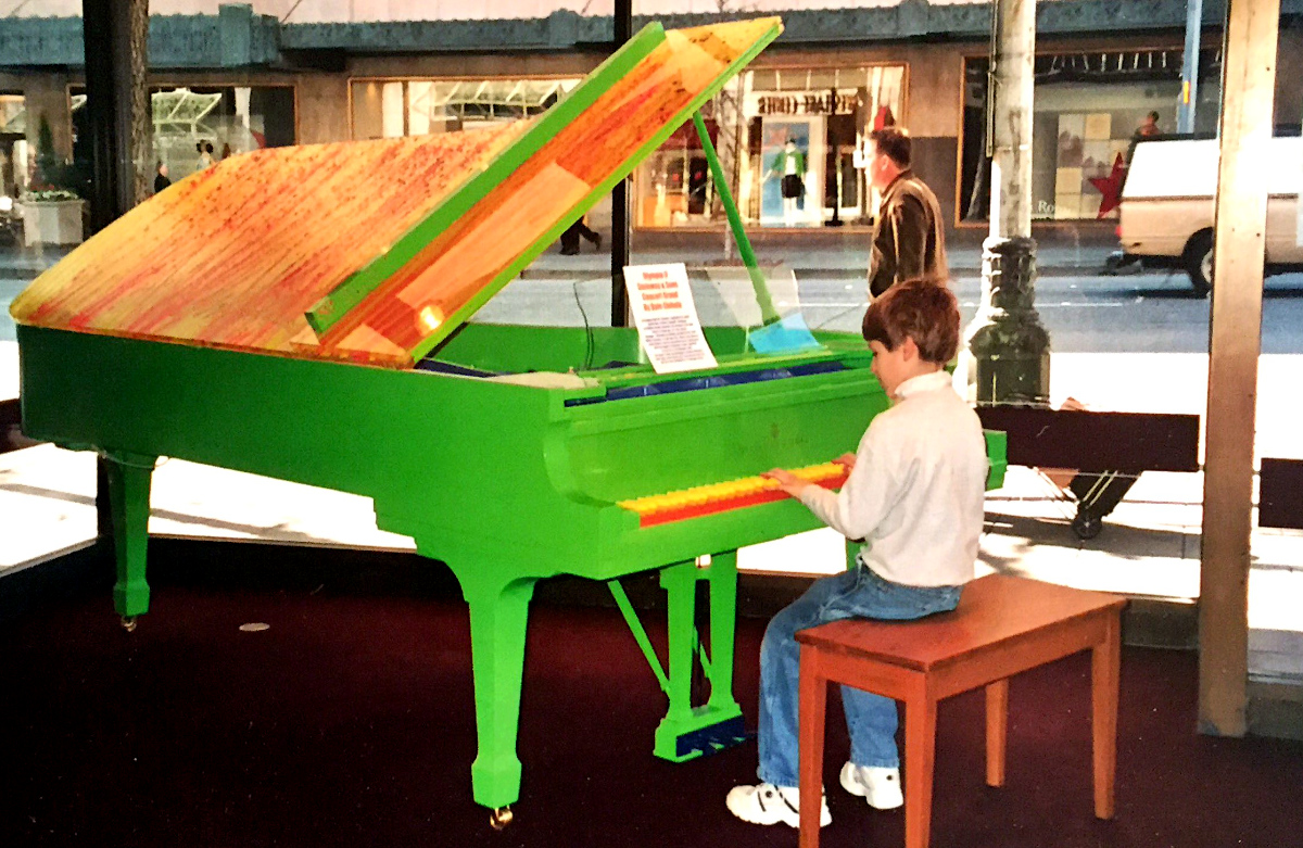 Fulbright 2019 recipient Garrett Snedeker playing piano at a young age.