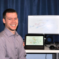 Goldwater 2020 winner Sean Thompson is shown using bioinformatics software to analyze data from the lab.