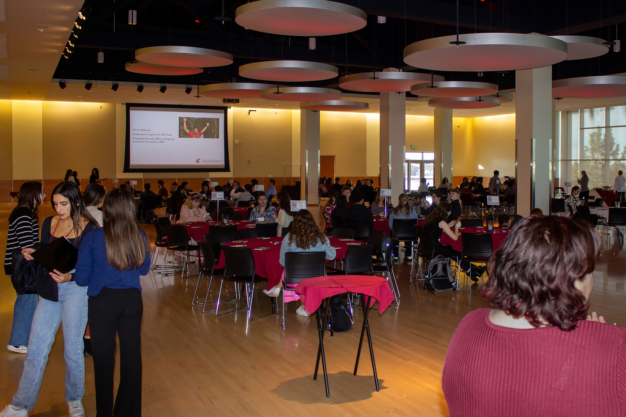 Full resolution of students taking their seats at Progression 2024.
