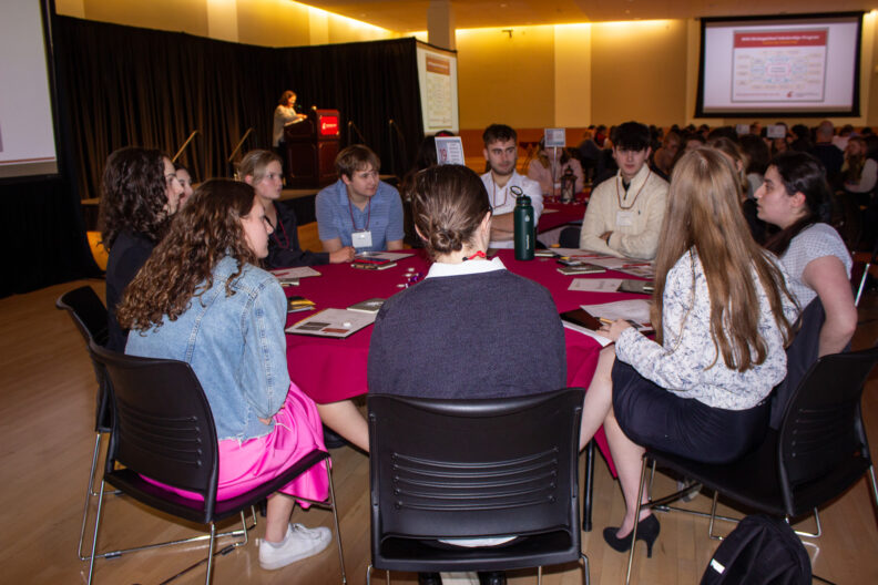 Full resolution of Ellie Curtright, John Bussey, and Darye Maysam giving their table talk.