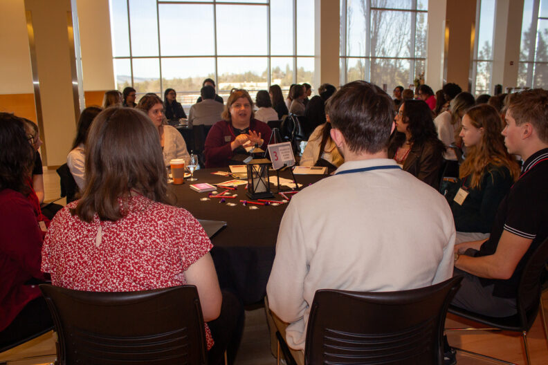 Full resolution of Terese King giving a table talk.