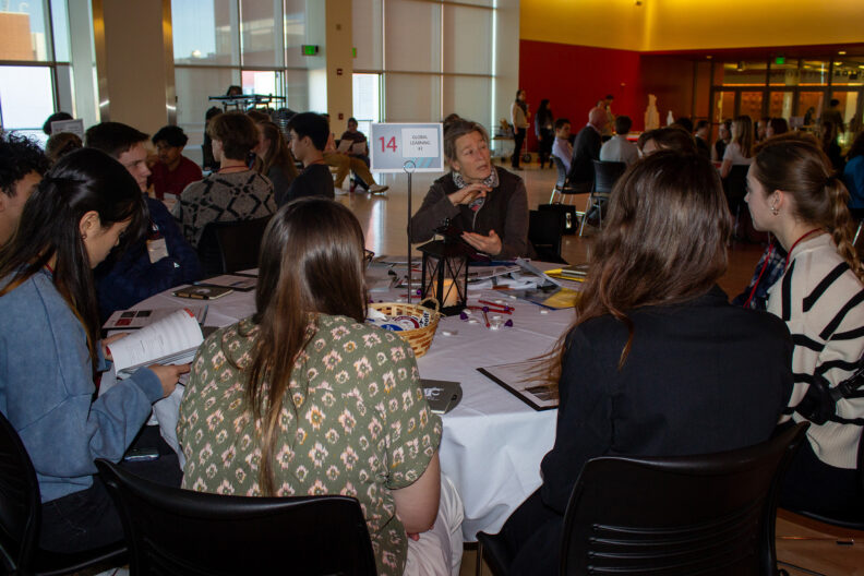 Full resolution of Cara Welch giving a table talk.
