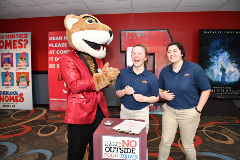 WSU's Butch mascot greats Village Centre Cinemas staff. Select to view full resolution version.
