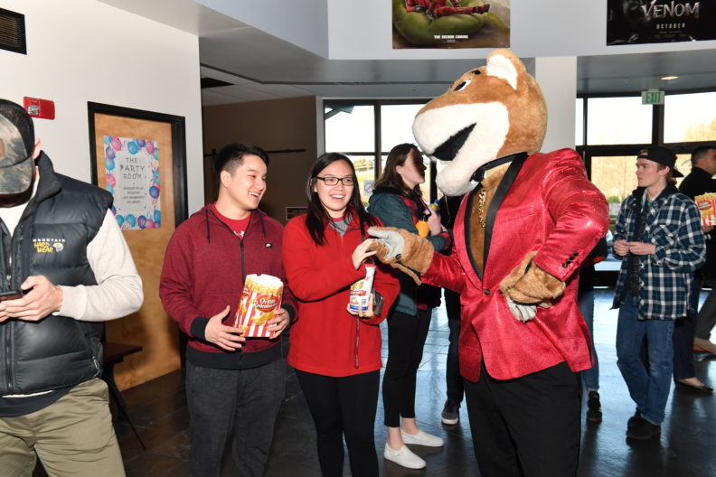 Washington State University students, faculty and staff attend the opening of the movie Ready Player One Wednesday, March 28, 2018 at Village Centre Cinemas in Pullman, Wash. Select to view full resolution version.