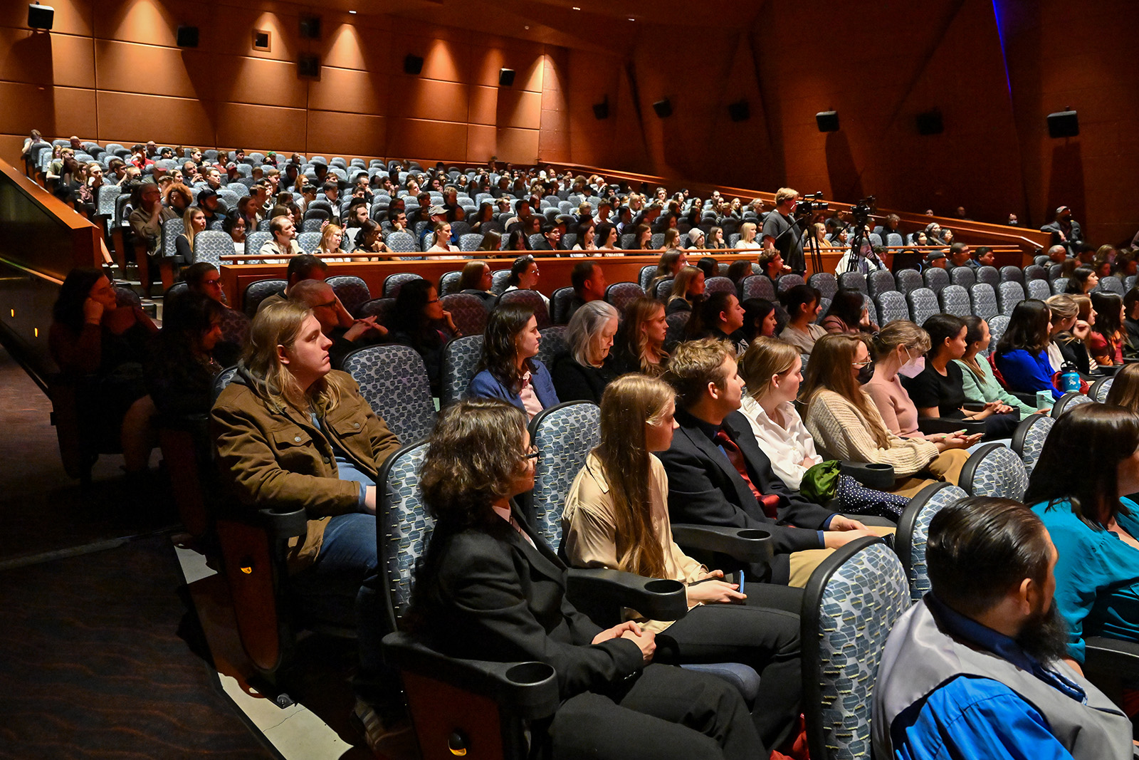 SURCA 2023 attendees wait for the award ceremony to start in the CUB auditorium.