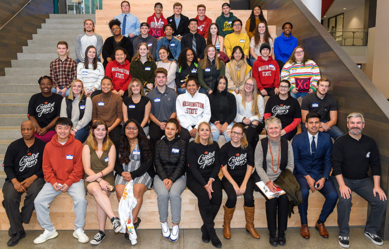 Finalists at the 2019 Abobe Creative Jam at Washington State University pose as a group for the camera.