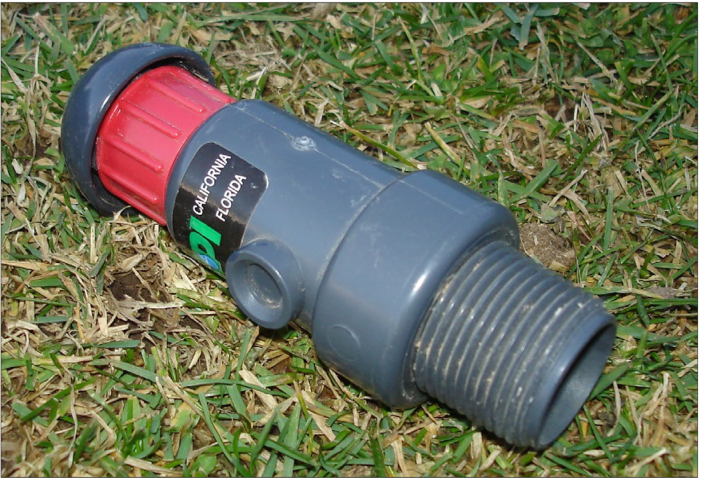 This air- and vacuum-release valve allows air out of the system while lines are filling with water, then lets air back in after the water pressure is removed.