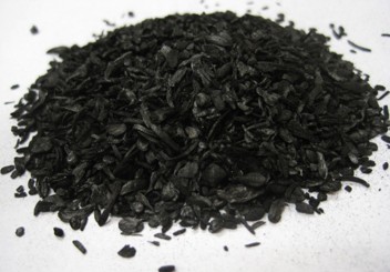 Small shavings of black biochar.