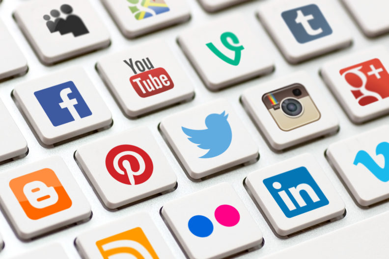 Modern Keyboard With Colored Social Network Buttons.