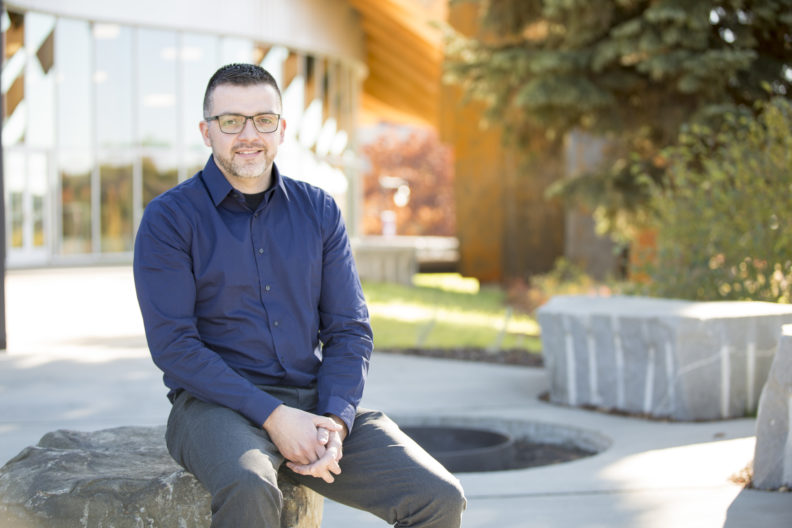 Barry Warren smiling at camera.