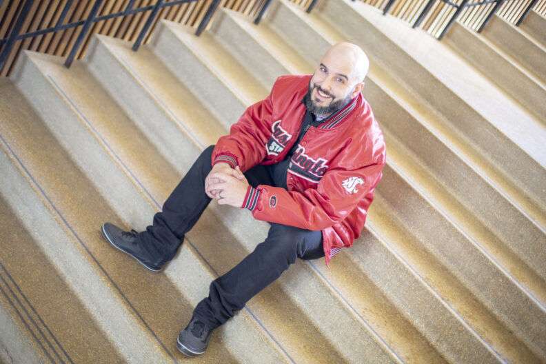 John Lupinacci sitting on the stairs