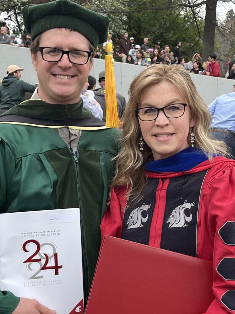 Sheri with her Ph.D. chair Marcus Poppen at graduation