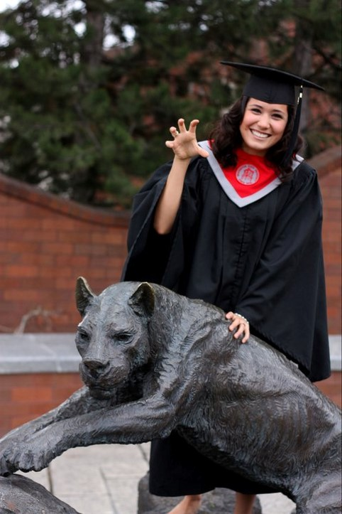 Margarita Magana with the coug statue