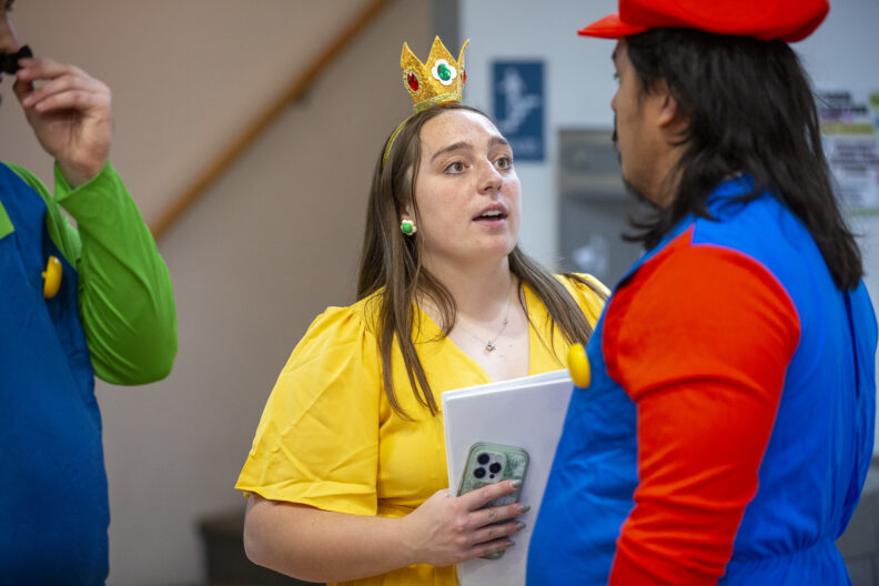 Kinsey talking to someone.