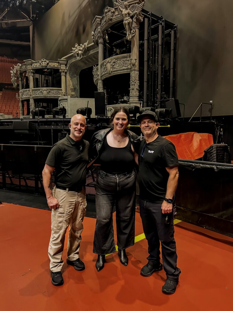 Monica McNamara, in the middle, with two big-named guests.