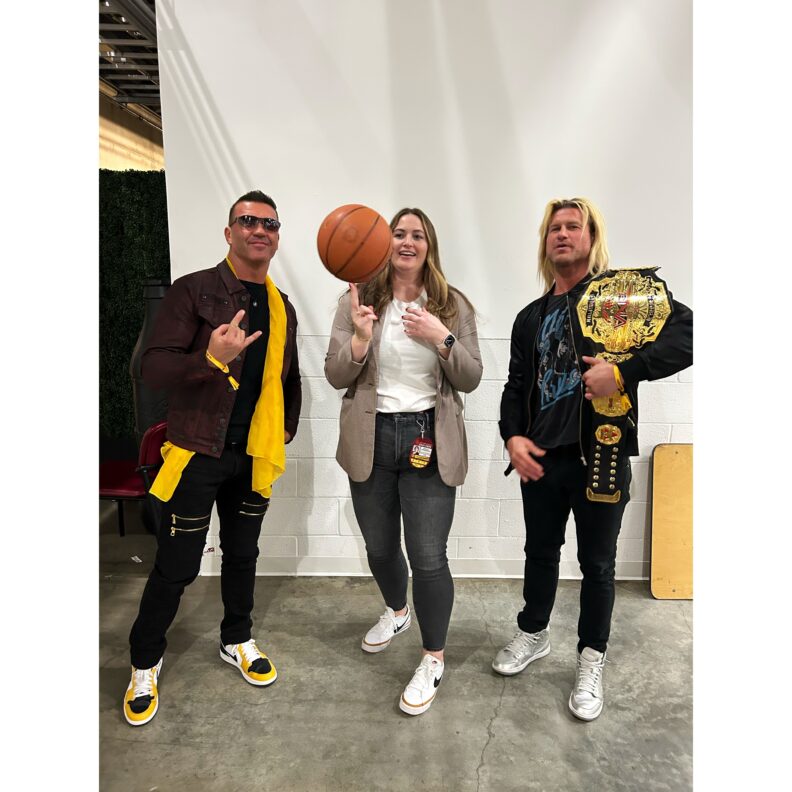 Monica McNamara, in the middle, with two big-named guests.