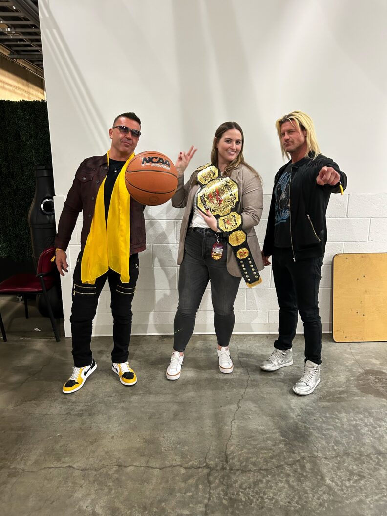 Monica McNamara, in the middle, with two big-named guests.