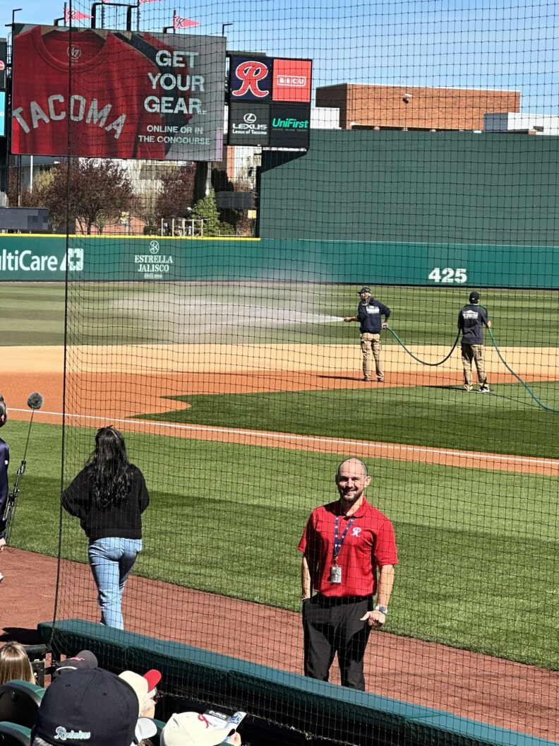 Colin standing on the field in Tacoma.