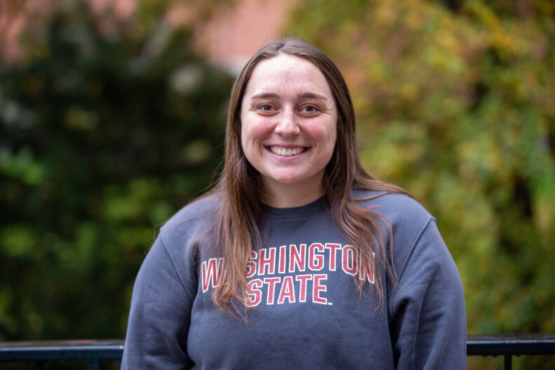 Kinsey Kallaher smiling at camera.
