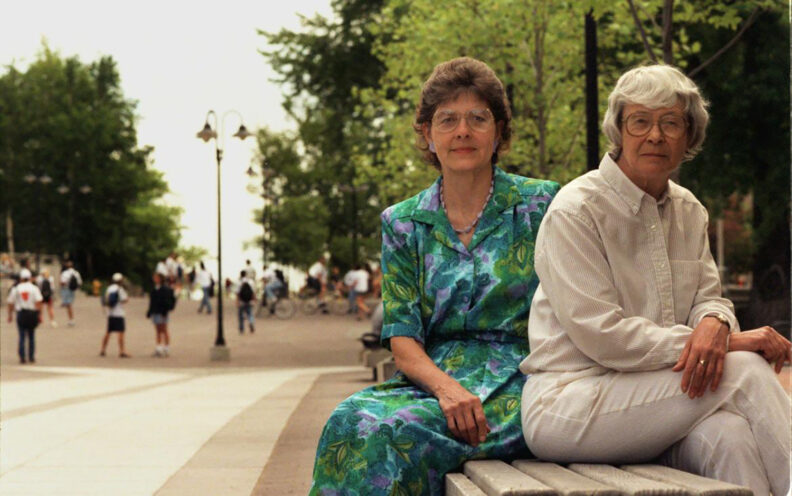 Sitting on the Glenn Terrell Mall in the 1990s, Sue Durrant (left) and Jo Washburn look into the camera.
