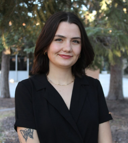 Alexis Nina Downey standing outside smiling