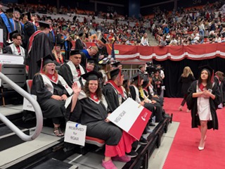 Roar Students at graduation