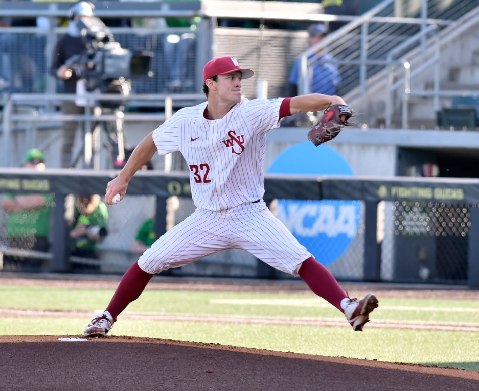 WSU baseball pitcher in mid-throw on the mound during a game