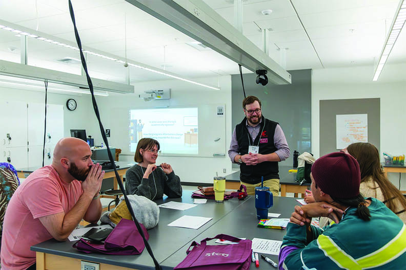 Ed Summit participants discuss things during one of the workshops.