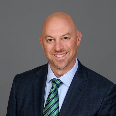 Chuck Arnold smiling at camera.