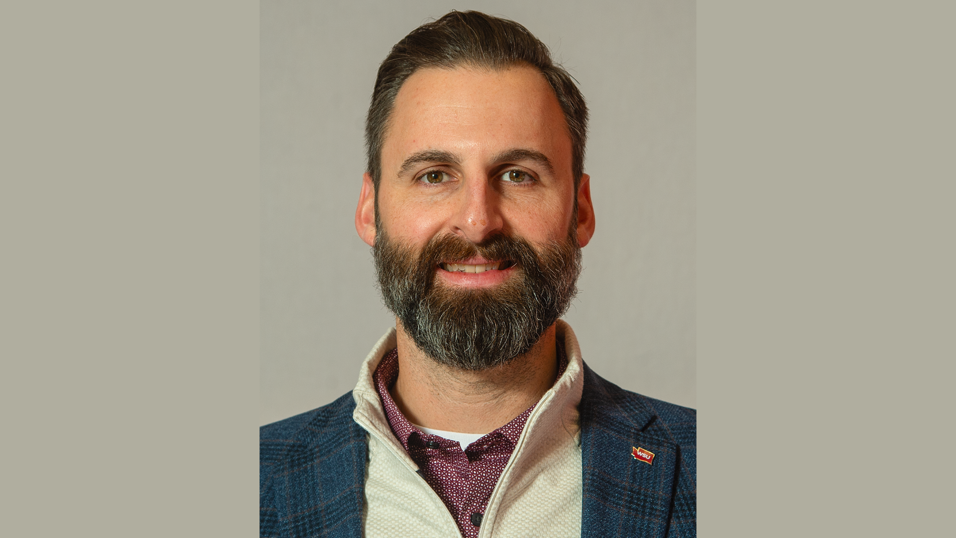 A photo of the Cougar Pride sculpture at sunset. Used as a placeholder for a headshot.