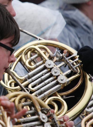 a photo of a french horn being played