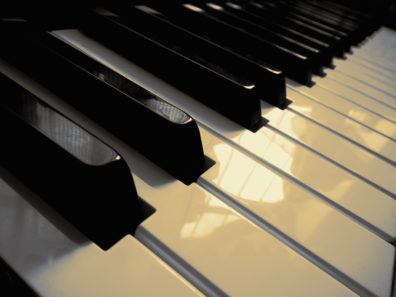 a close up photo of the keys on a piano