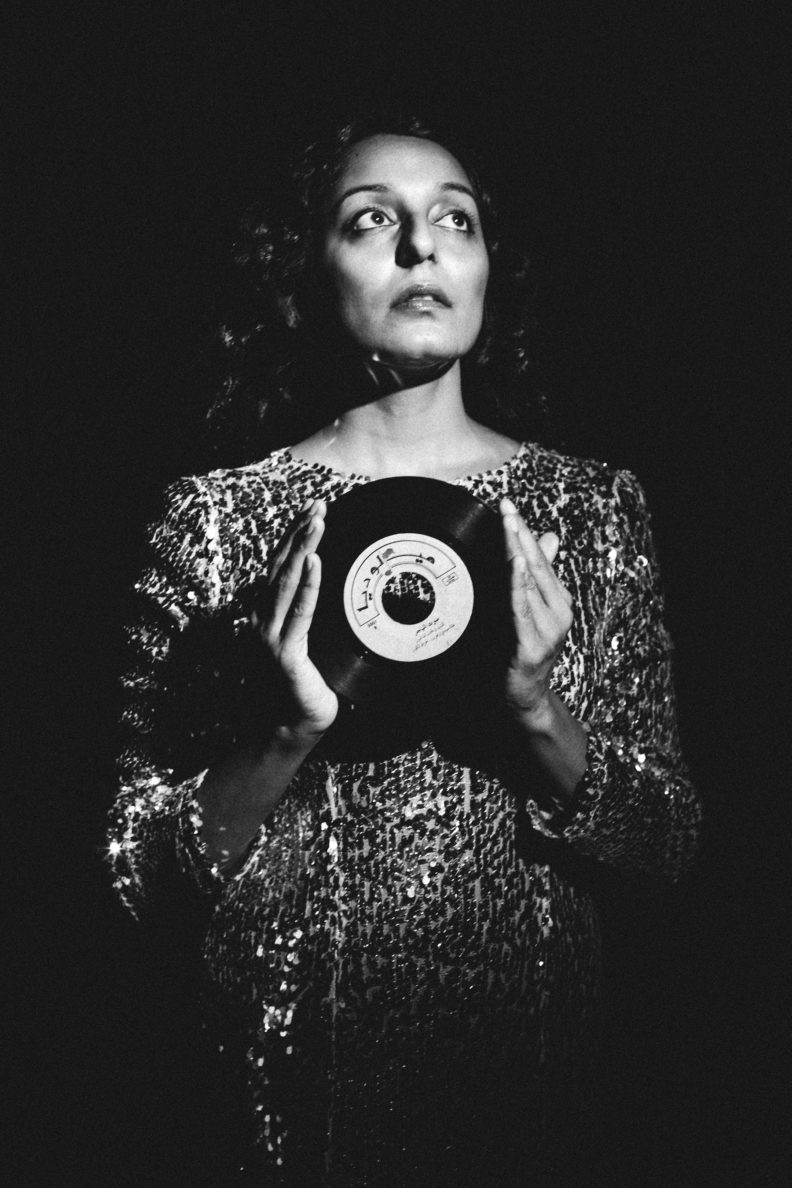 Woman holding a 45 record