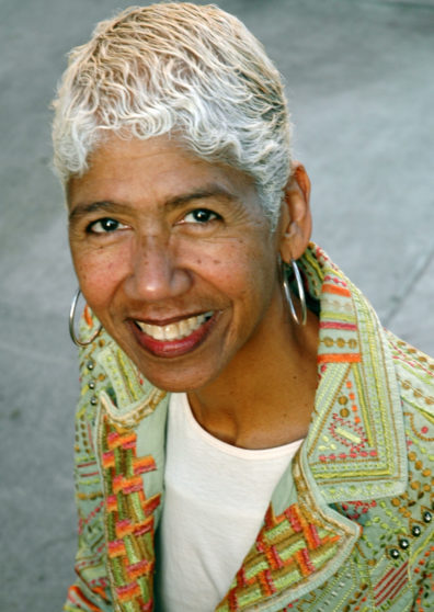 Headshot of Ericka Huggins.