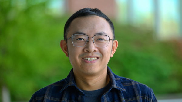 Zeyang Shen, outside on a sunny day. 